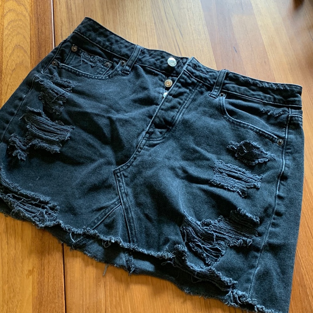 Distressed black mini skirt